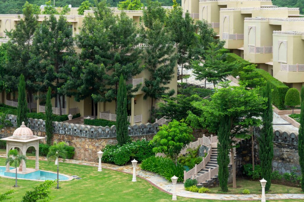 Beautiful resort architecture surrounded by lush greenery in Kumbhalgarh, Rajasthan.(Luxury Travel in Rajasthan)